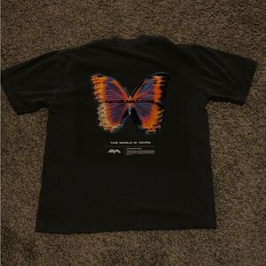 Above Millions Butterfly Tee